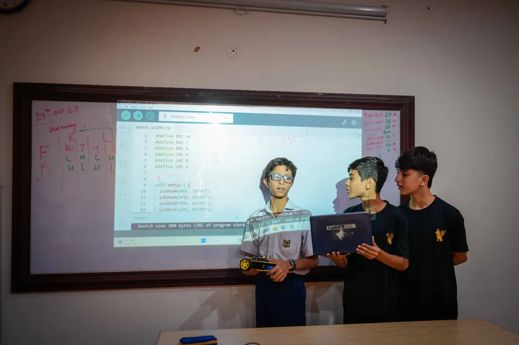 Students presenting robotic car project